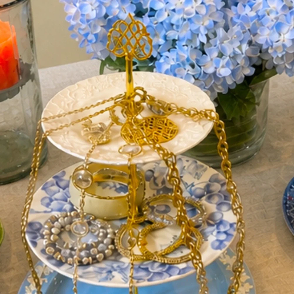 Handmade jewelry display or dessert display made out of vintage plates